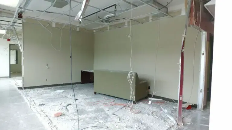 The green room before, from the other side, drywall dust and loose cables