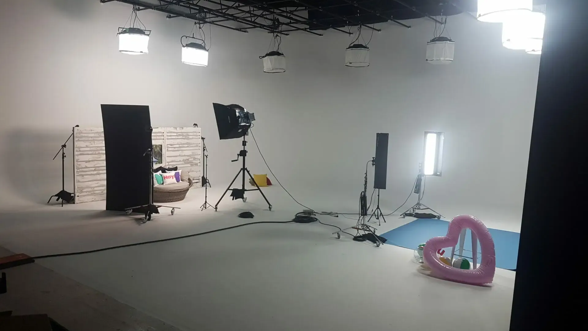 A second set from the same influencer day, a daybed and cushions on the cyc under film lights