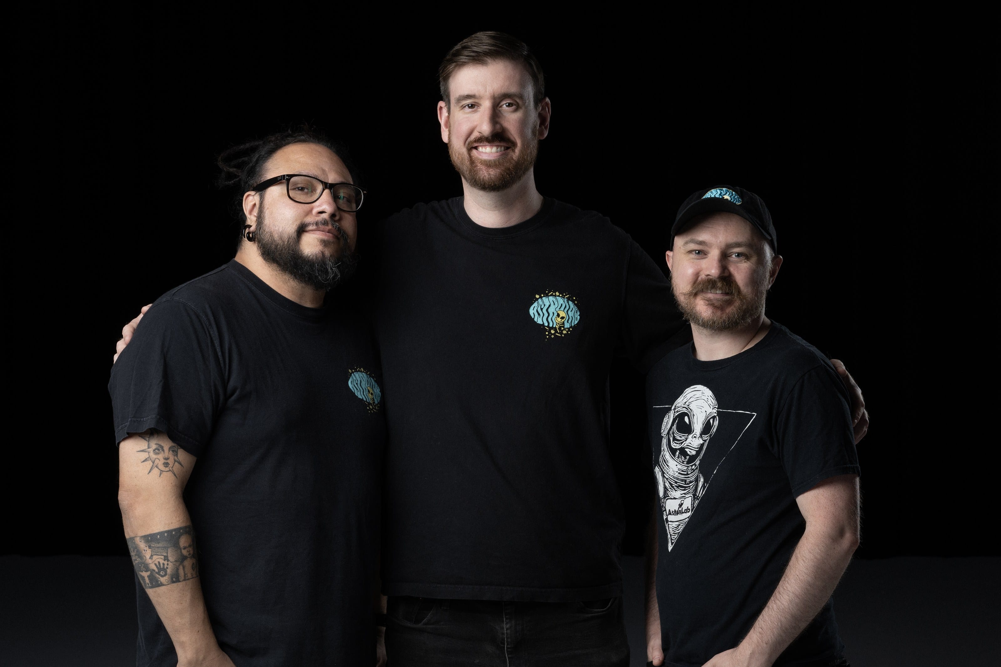 German Prieto, Adam Griffiths and Jesse Kellestine, the AstroLab team, standing together on the stage