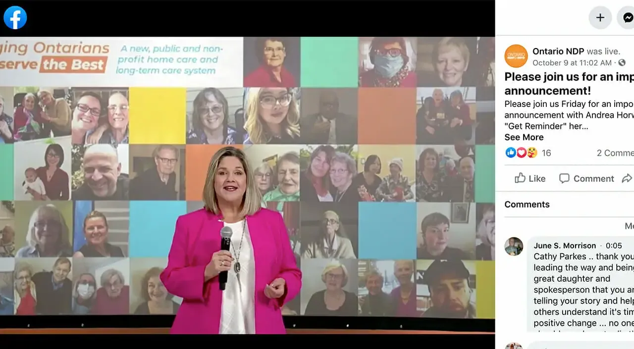 An Ontario NDP live stream set up on the stage, panel seating lit for camera